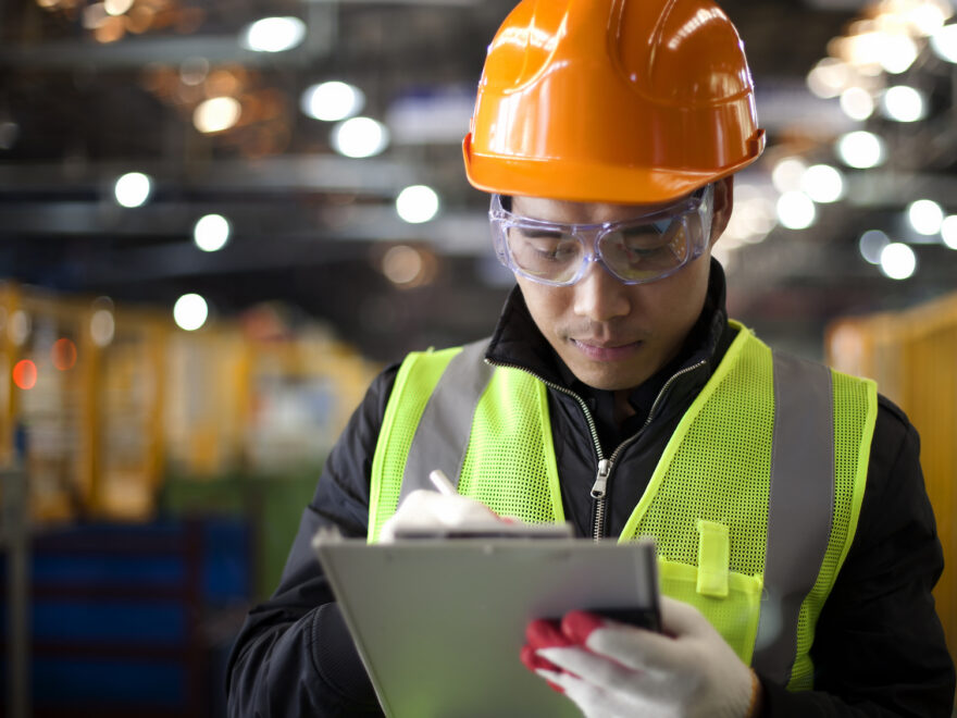 Close-up of a safety audit checklist document with sections to review in workplace safety